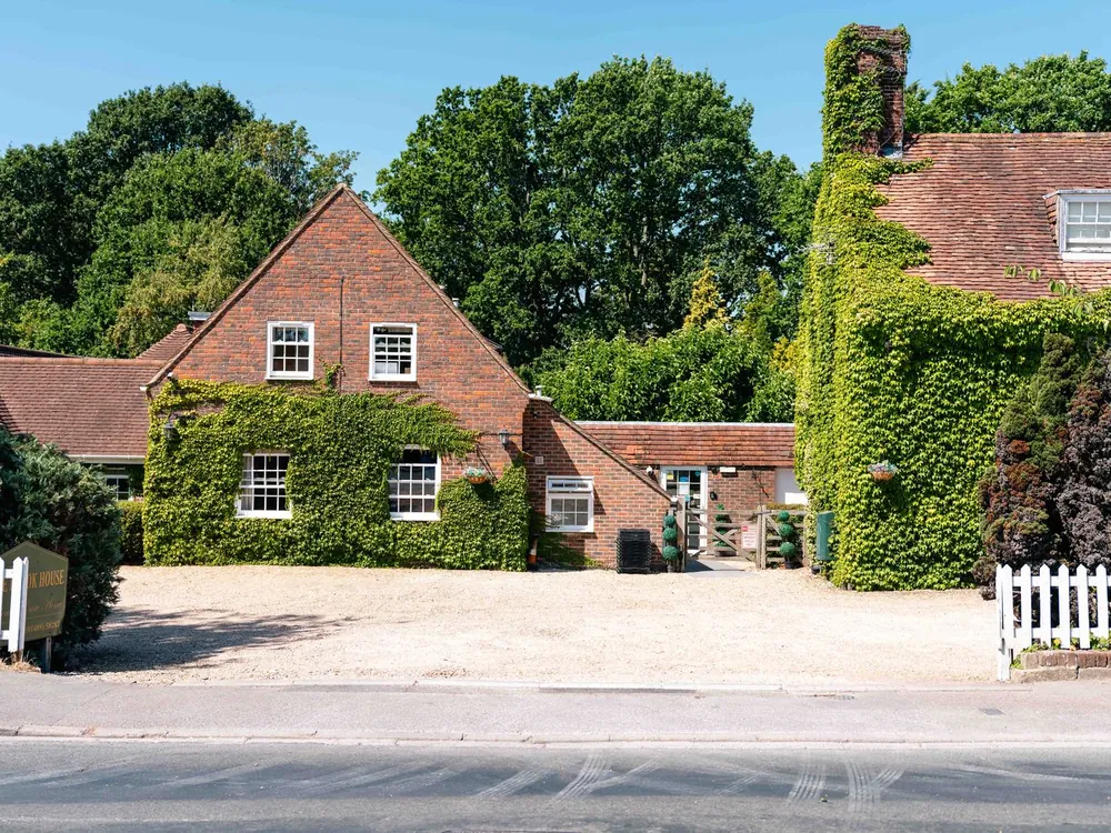 Little Brook House, a Grade II listed former farmhouse with ivy-covered walls, in Warsash
